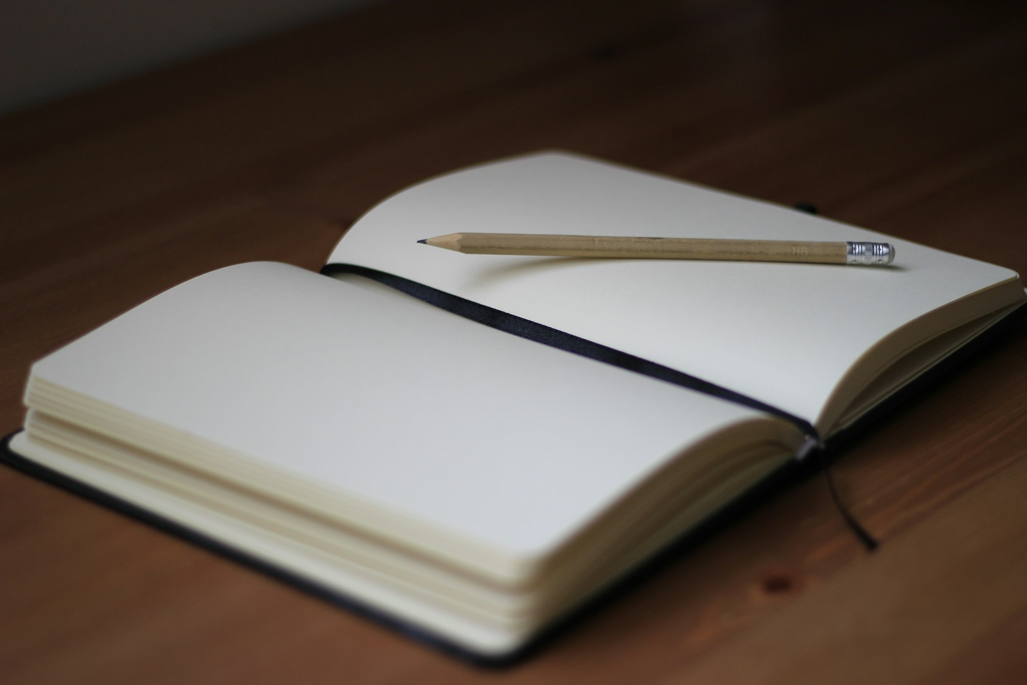 a notebook and a pen for gratitude journaling